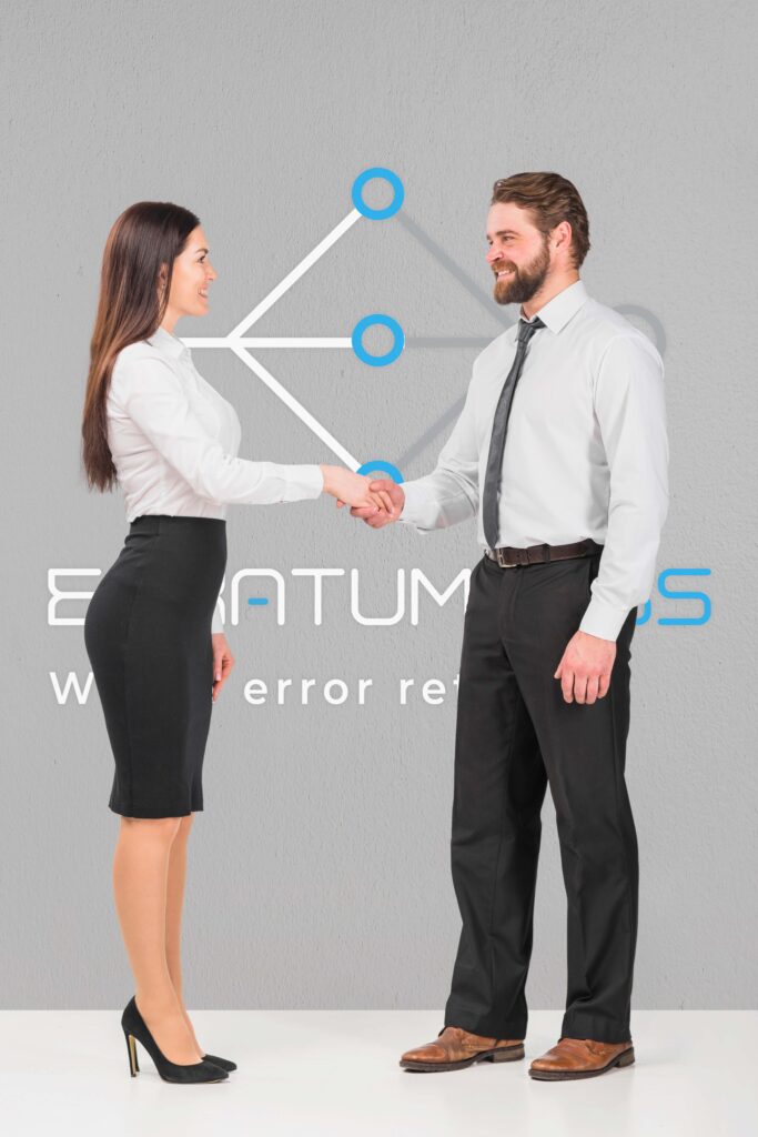 colleagues female male shaking hands